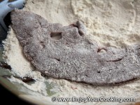 Dust each liver slice with flour from each side