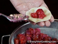 Put a teaspoon of cherry sugar mix in the middle of a dough circle