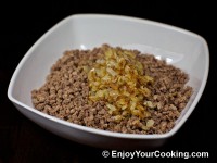 Add onions to meat