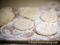 From each piece of dough form round dough circle (use rolling pin if needed)