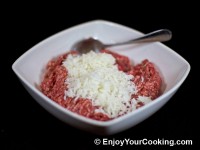 In a big bowl add rice to meat 