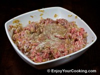 Season with salt and black pepper, mix