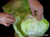 Separate a leaf from cabbage using knife 