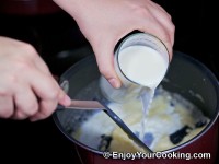Gradually add warmed up milk