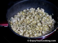 Add dried basil and oregano