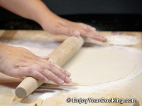 Roll it 2-3 mm thin with a rolling pin