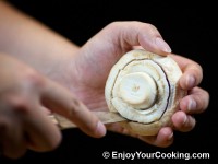 To cut mushroom in circular motion