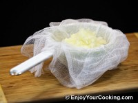 Put chopped onions into cheesecloth