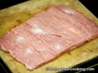 Lay meat flat, rub with salt from both sides