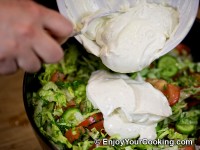 Pour dressing to the bowl