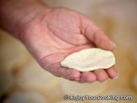 Take a circle of dough