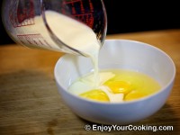 Crack eggs to a bowl, add milk