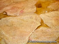 Season chicken meat with salt and ground black pepper to taste