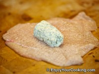 Arrange a bit more than 1 oz of herb butter in the middle of big piece