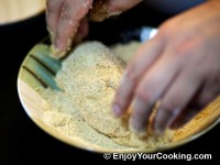 And roll in bread crumbs again
