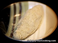 Press coating into cutlet good, move to a plate