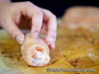 Arrange end piece of chicken is under the roll