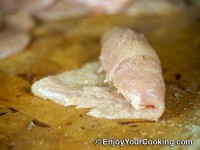 Fold meat to form a roll around