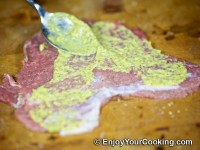Smear a bit of mustard on top of it