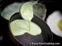 Ladle batter, pour it on a side of the skillet