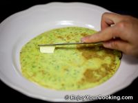 Transfer to a plate and smear with butter